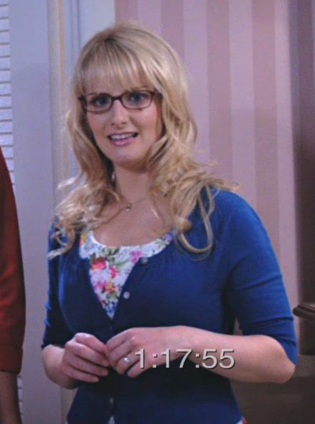 Bernadette's blue cardigan over flower dress on The Big Bang Theory