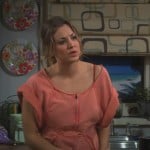 Penny’s orange off shoulder top on The Big Bang Theory