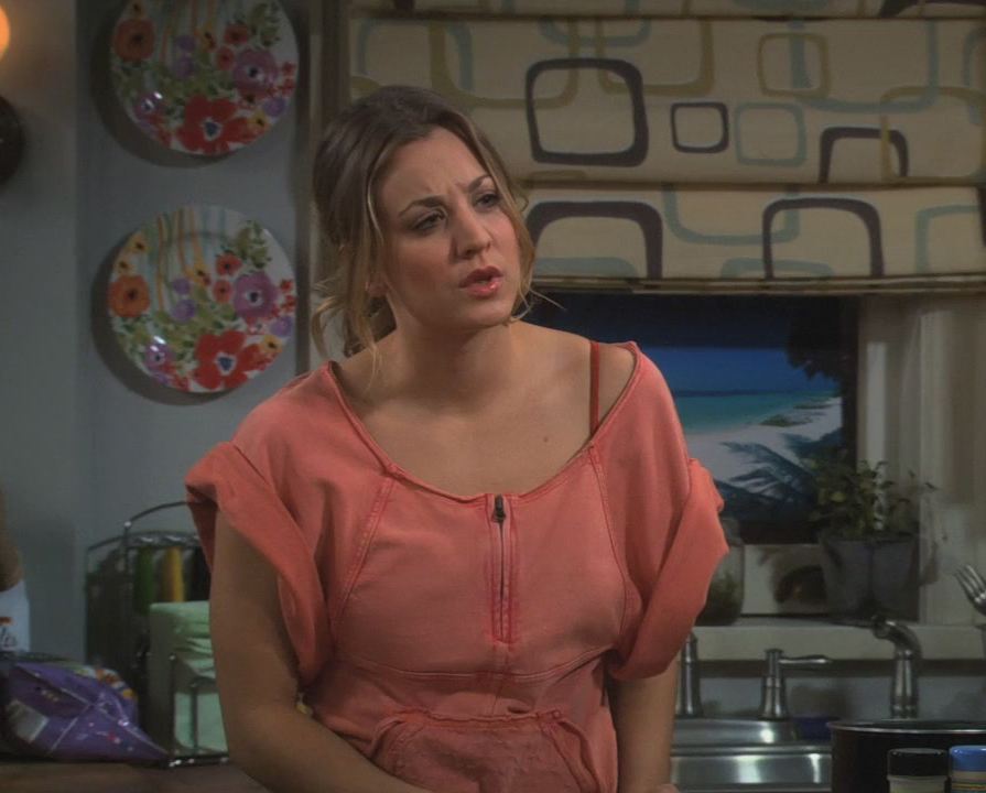 Penny's orange off shoulder top on The Big Bang Theory