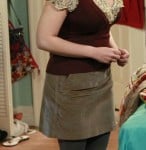 Bernadette’s burgundy vest and beige skirt on The Big Bang Theory