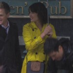 Robin’s yellow coat and black/brown crossbody bag on How I met your mother