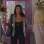 Penny’s gold heart necklace and grey blazer on Happy Endings