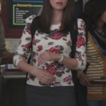 Annie’s white flower print sweater with grey mini skirt on Community