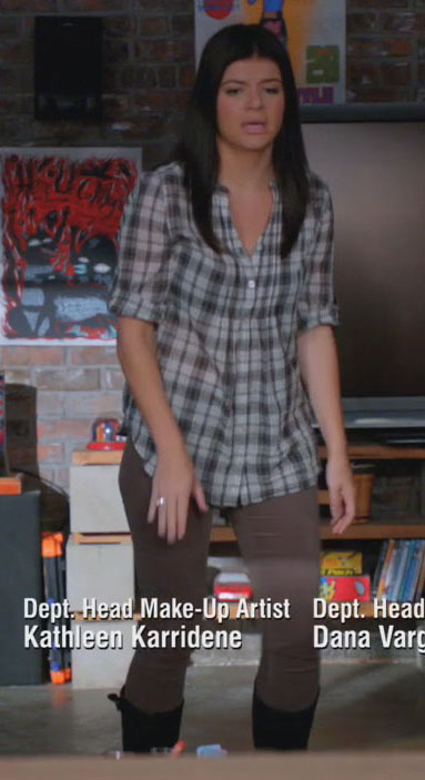 Penny's check shirt and brown pants on Happy Endings