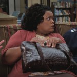 Shirley’s brown leather bag on Community