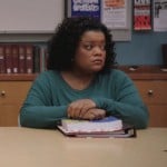 Shirley’s green long sleeve blouse