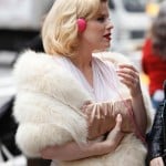 Ivy’s white fur wrap/stole and pink headphones from Smash
