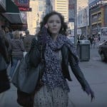 Karen’s purple fingerless gloves and blue bag on Smash