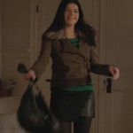 Penny’s green striped top and brown jacket on Happy Endings