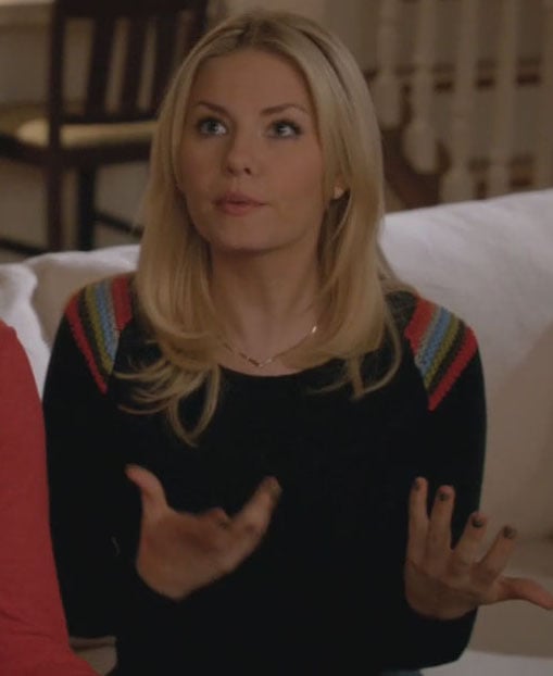 Alex's black sweater with colored stripes on the shoulder on Happy Endings