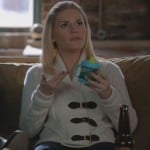 Alex’s white knit cardigan with leather buckles on Happy Endings