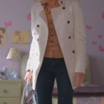 Jane’s white coat and blue handbag on Happy Endings