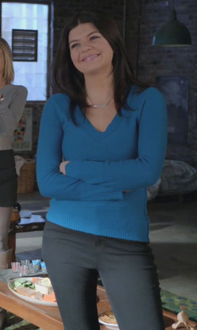 Penny's blue v-neck sweater on Happy Endings