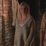 Alex’s yellow and grey oversized sweater on Happy Endings