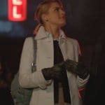 Jane’s white coat with blue bag and black leather gloves on Happy Endings