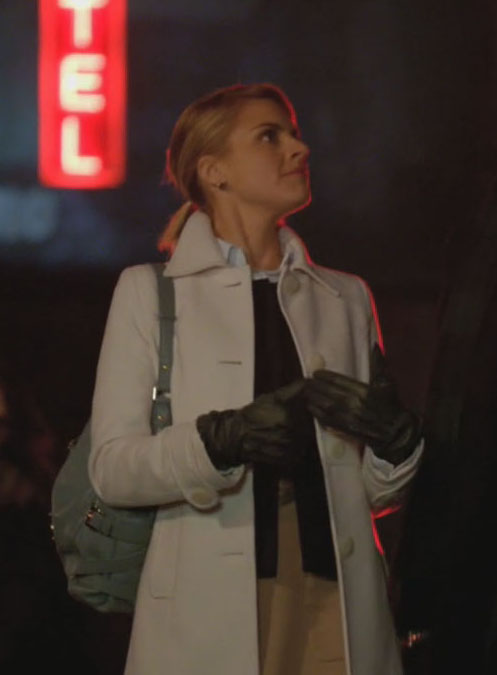 Jane's white coat with blue bag and black leather gloves on Happy Endings