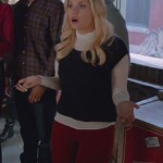 Alex’s red pants with white turtleneck top