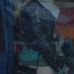 Alex’s black crossbody bag on Happy Endings