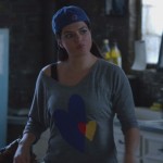 Penny’s grey heart sweater on Happy Endings