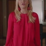 Alex’s hot pink blouse and earrings on Happy Endings