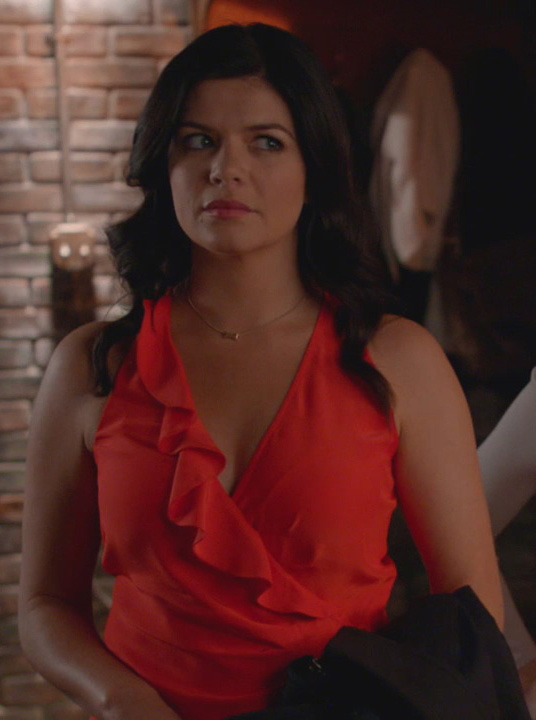 Penny's red/coral ruffle wrap top on Happy Endings