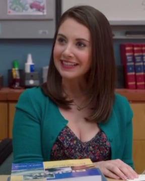 Annie's floral dress and green cardigan on Community