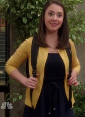 Annie’s navy dress and yellow cardigan on Community