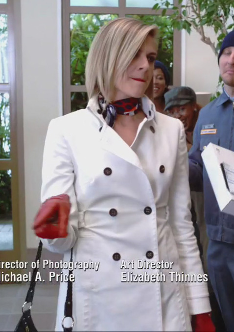 Jane's white coat with red gloves on Happy Endings