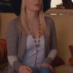 Alex’s lace sleeve cardigan and floppy hat on Happy Endings