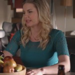 Alex’s teal green lace top on Happy Endings