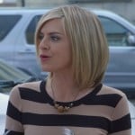 Jane’s cream and black top with bead necklace on Happy Endings