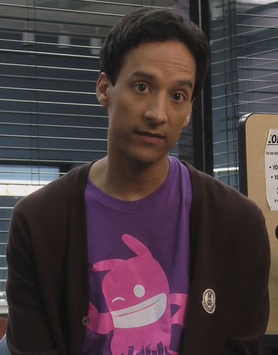 Abed's purple shirt with pink character on it on Community