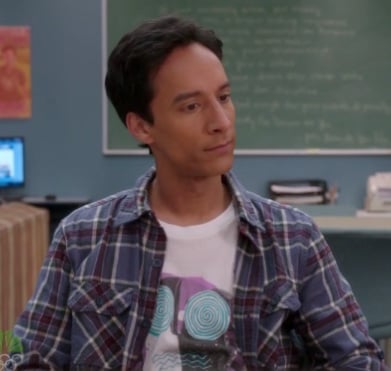 Abed's white shirt with swirl graphic on Community