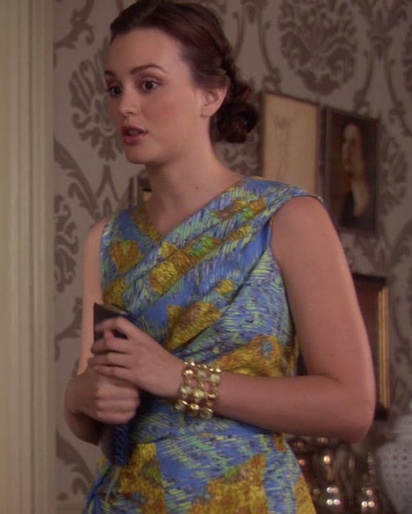 Blair’s blue and yellow dress with gold bracelet and blue clutch on Gossip Girl