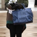 Serena’s green coat and scarf with blue handbag on Gossip Girl