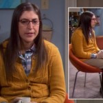 Amy’s yellow knit cardigan with brown tights on The Big Bang Theory