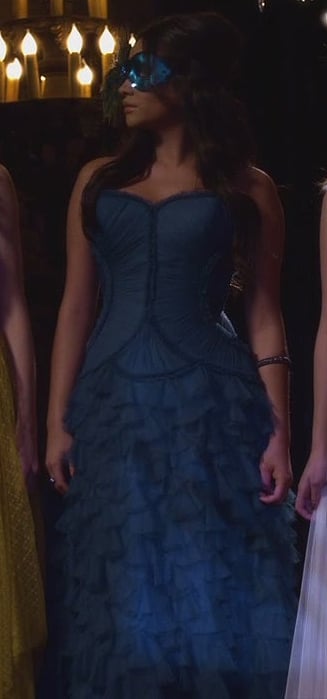Emily's blue ruffle gown at the masquerade gala