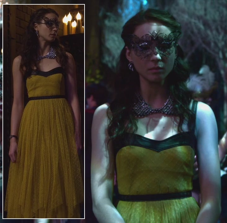 Spencer's yellow dress at the masquerade gala on Pretty Little Liars