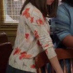Annie’s cream and orange floral cardigan on Community