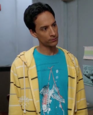 Abed's blue shoe graphic shirt with yellow striped hoodie on Community