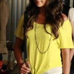 Emily’s yellow tie front top and black pants on Pretty Little Liars