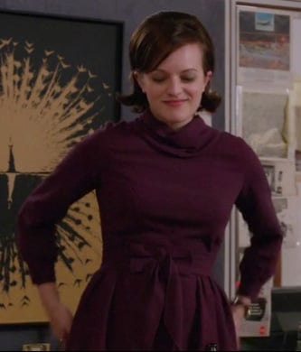 Peggy's purple cowl neck dress with bow on Mad Men