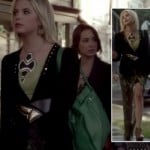 Hanna’s studded blazer, green skirt and bag with statement necklace