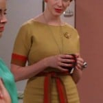 Joan’s mustard and orange dress on Mad Men