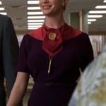 Joan’s purple dress with pink tie on Mad Men