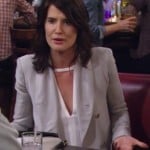 Robin’s white cutout blouse and light grey blazer on How I Met Your Mother