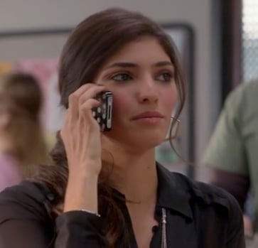 Shauna's black polka dot iphone cover on Mindy Project