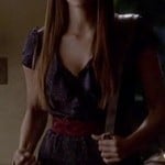 Elena’s navy printed ruffle dress on The Vampire Diaries