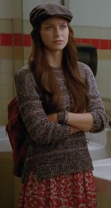 Marley's red and white patterned skirt and brown striped sweater on Glee