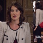 Robin’s cream double breasted blazer with black trim and red purse on How I Met Your Mother